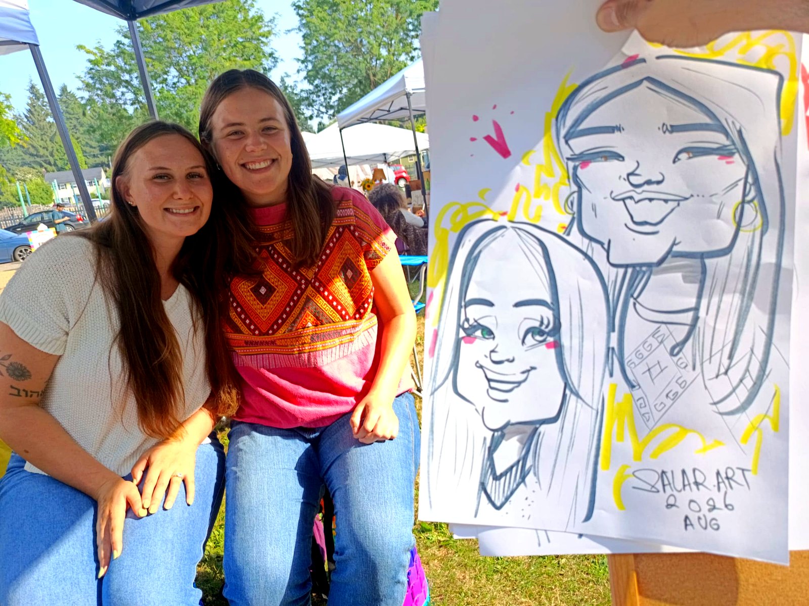 Two friends beside their colour marker caricature — Greater Vancouver, BC